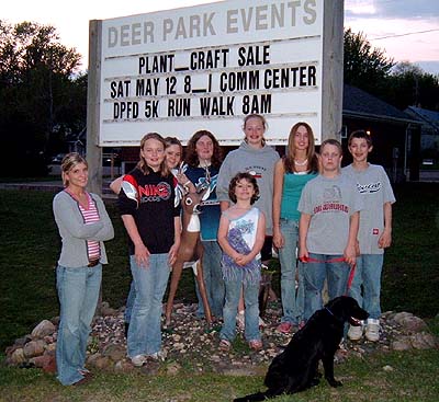 North Country work crew at sign